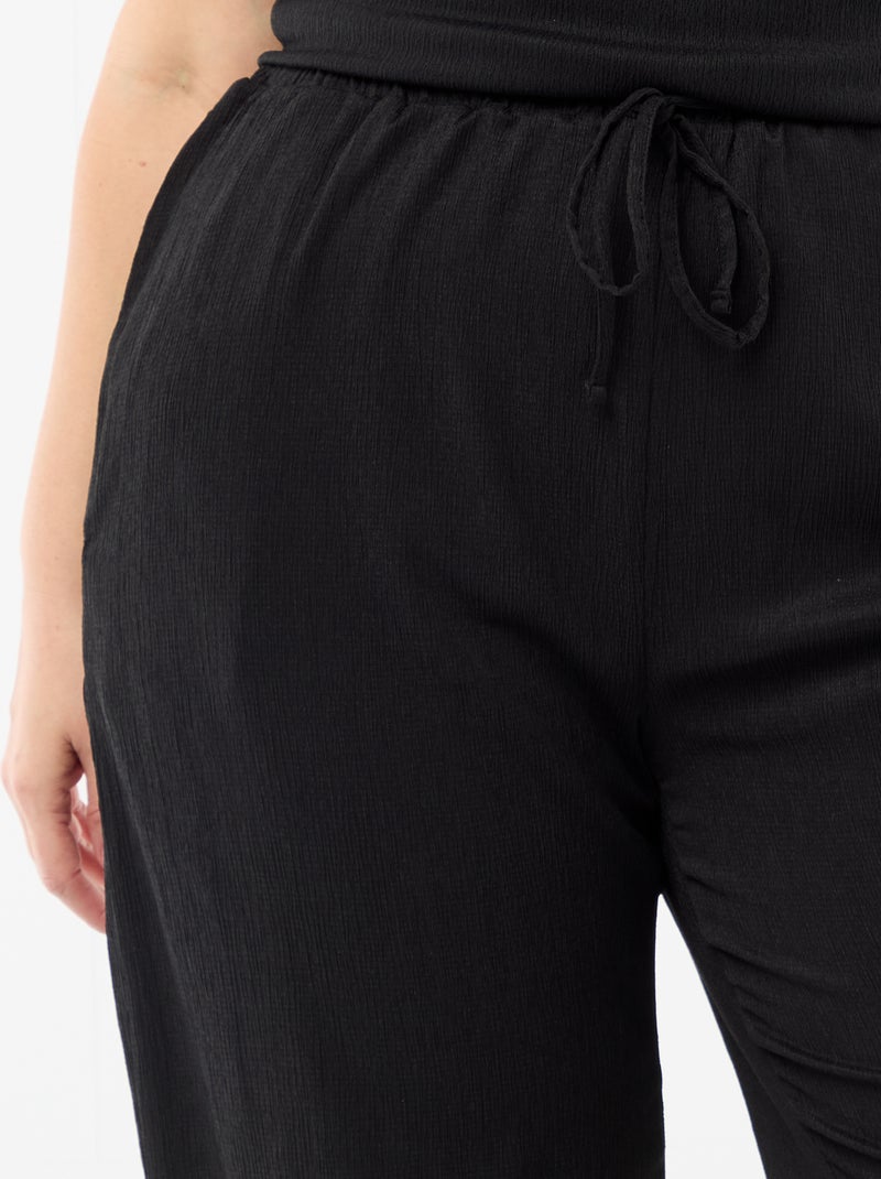 Pantaloni ampi in maglia crêpe Nero - Kiabi