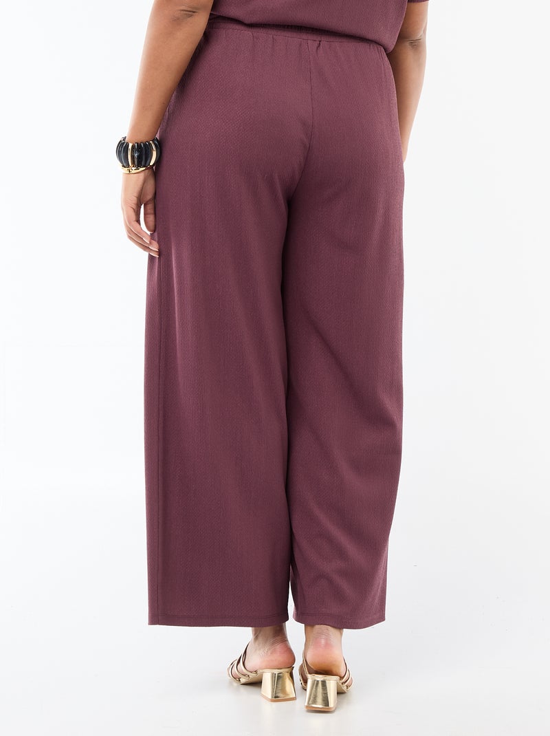 Pantaloni ampi in maglia goffrata Rosa - Kiabi