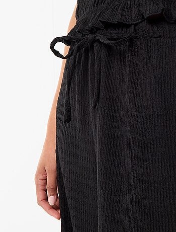 Pantaloni ampi in maglia smock