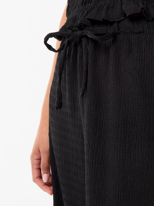 Pantaloni ampi in maglia smock - Kiabi