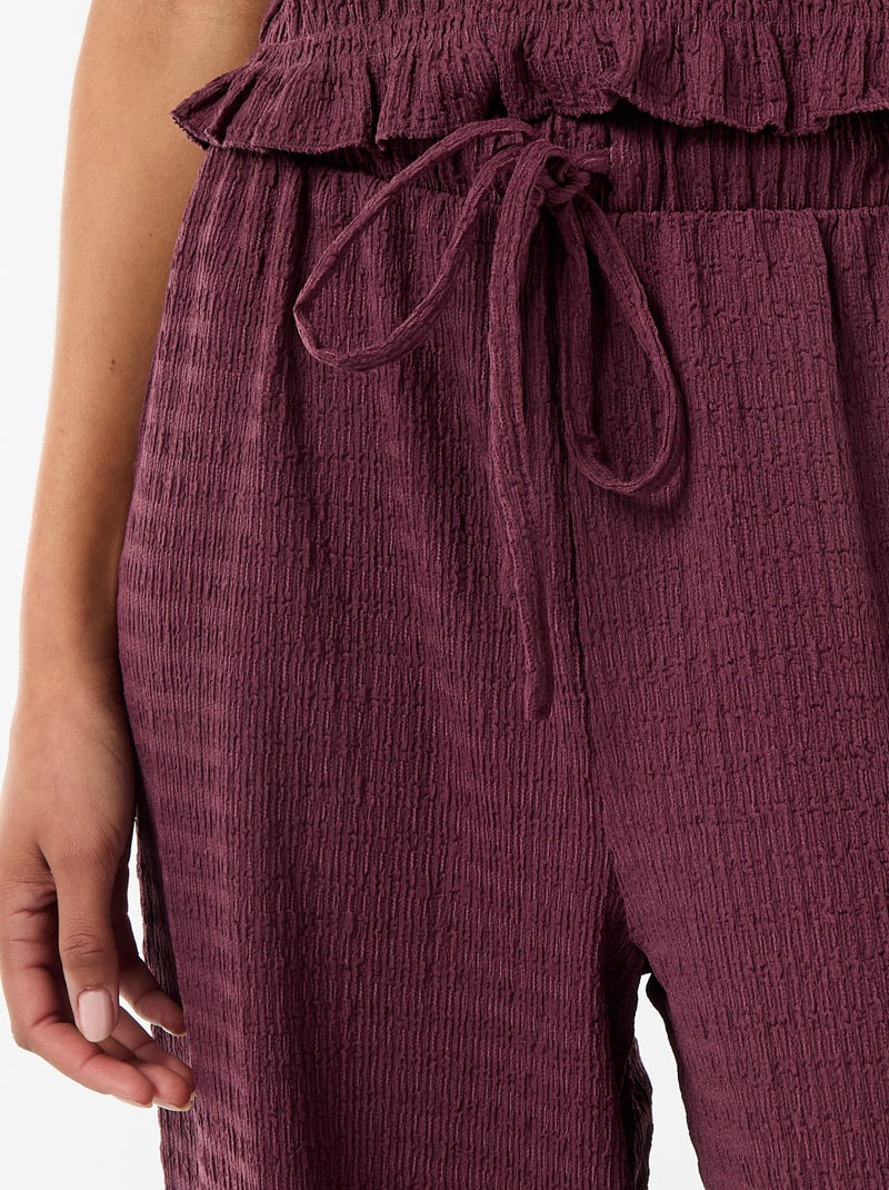 Pantaloni ampi in maglia smock Viola - Kiabi