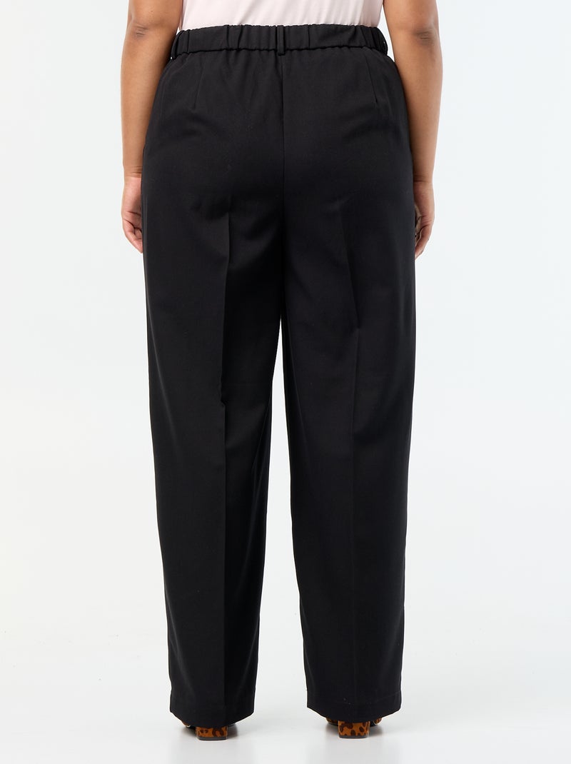 Pantaloni ampi in tessuto fluido Nero - Kiabi