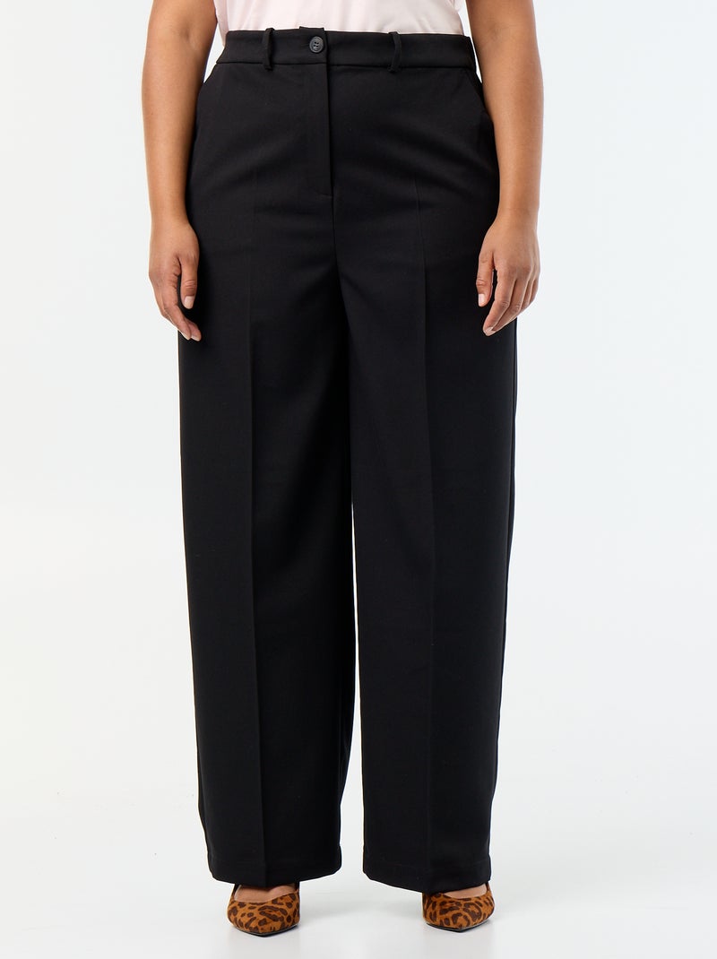 Pantaloni ampi in tessuto fluido Nero - Kiabi