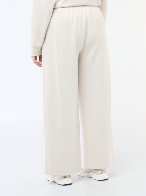 Pantaloni ampi in tessuto stretch a coste - Kiabi
