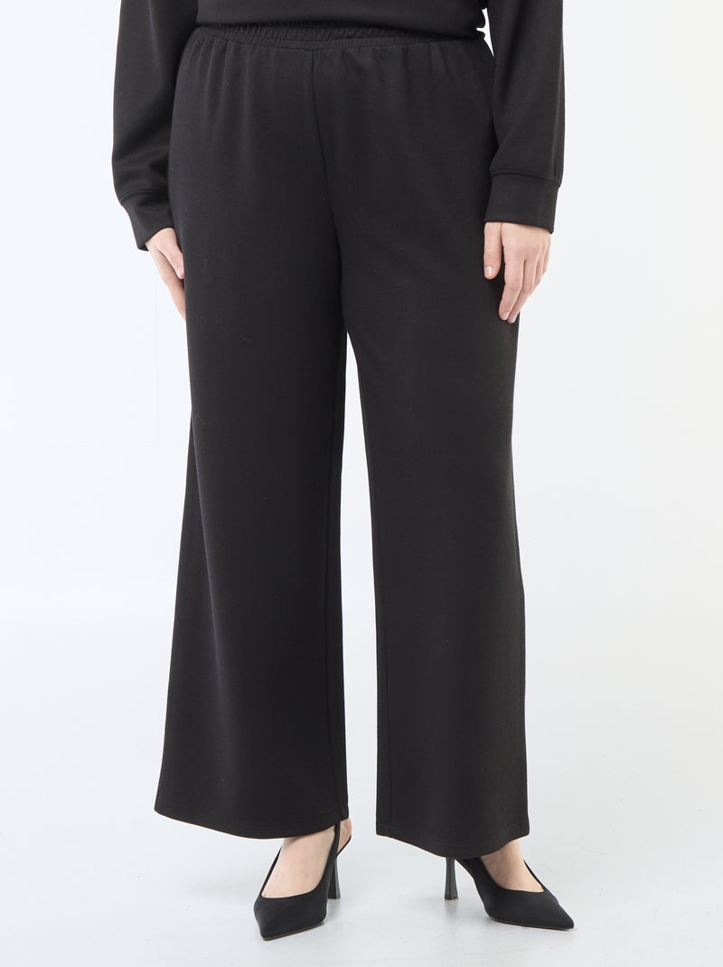 Pantaloni ampi in tessuto stretch a coste Nero - Kiabi