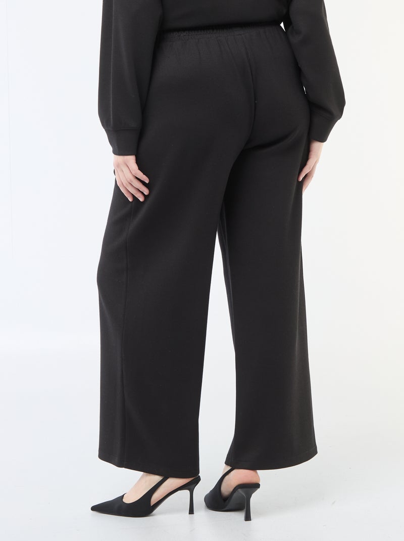 Pantaloni ampi in tessuto stretch a coste Nero - Kiabi