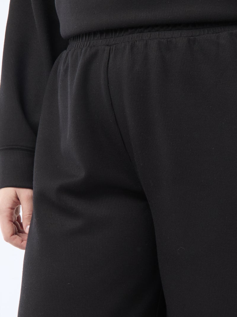 Pantaloni ampi in tessuto stretch a coste Nero - Kiabi