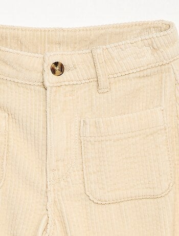 Pantaloni ampi in velluto tinta unita