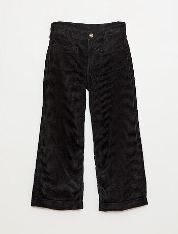 Pantaloni ampi in velluto tinta unita