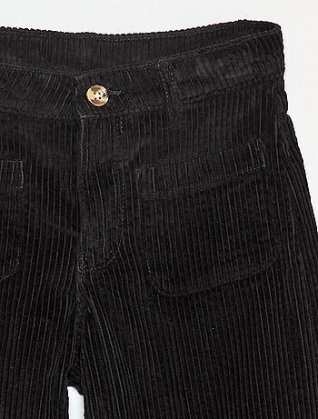 Pantaloni ampi in velluto tinta unita