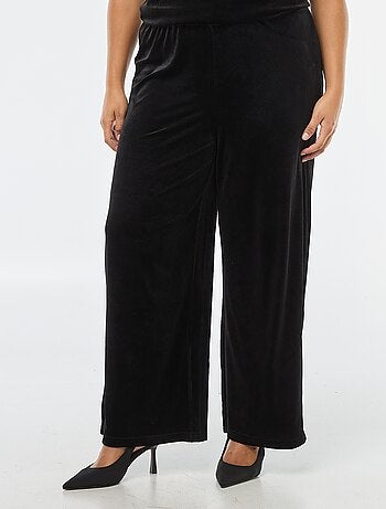 Pantaloni ampi in velluto tinta unita