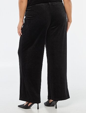 Pantaloni ampi in velluto tinta unita