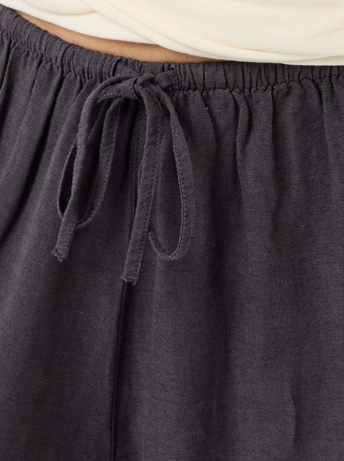 Pantaloni ampi tinta unita con cintura elasticizzata - Kiabi