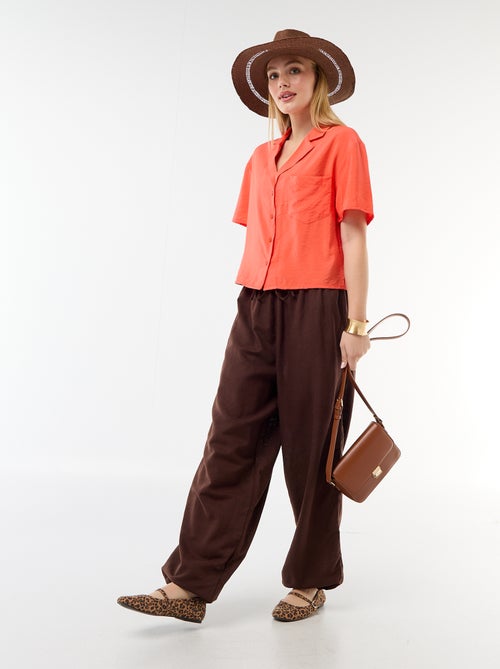 Pantaloni ampi tinta unita con cintura elasticizzata - Kiabi