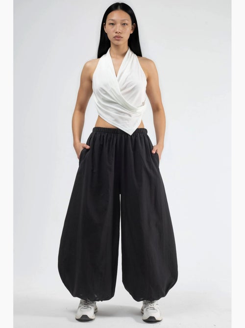 Pantaloni balloon con vita elasticizzata e tasche busem - Kiabi Pantaloni balloon con vita elasticizzata e tasche busem - Kiabi