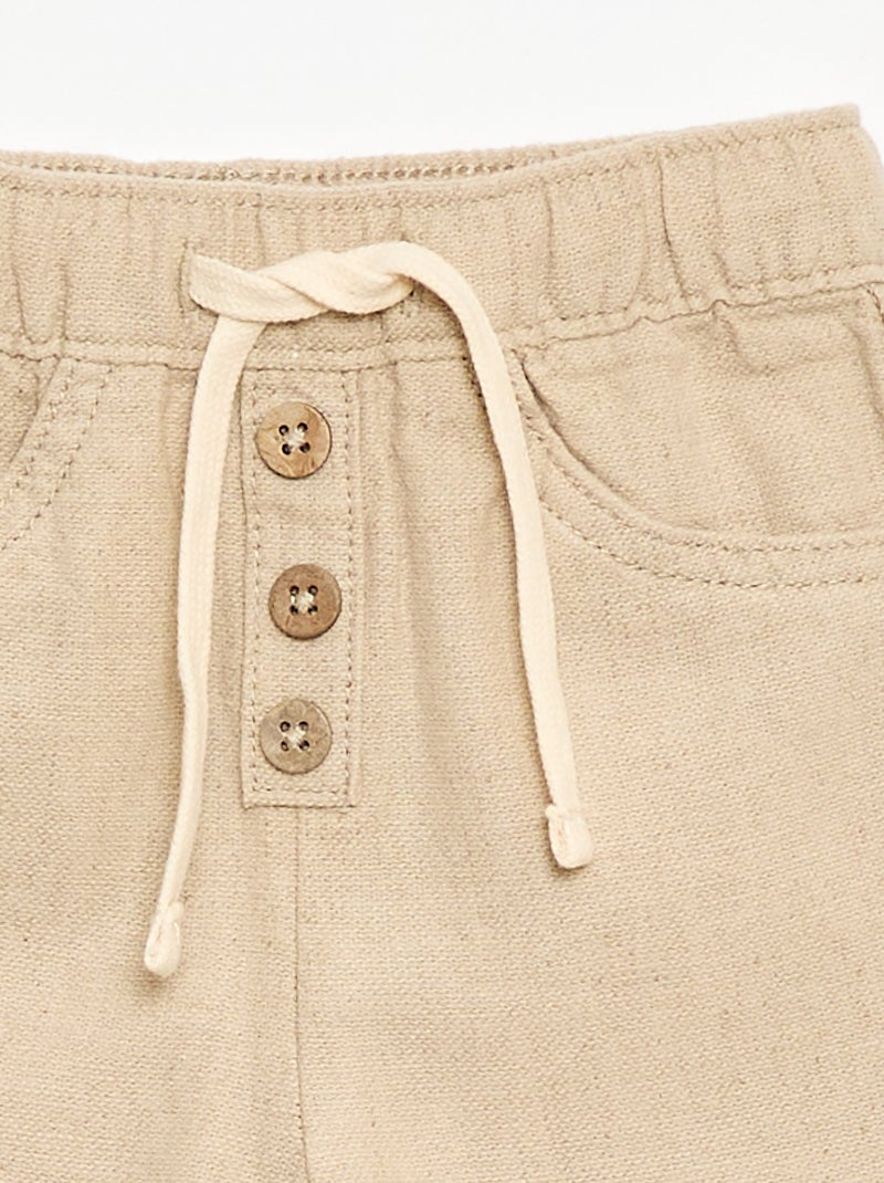 Pantaloni bianchi con sottili righe Beige - Kiabi