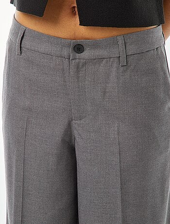 Pantaloni city larghi con pinces