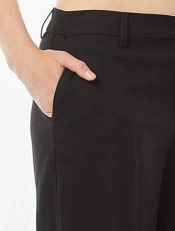 Pantaloni city larghi con pinces