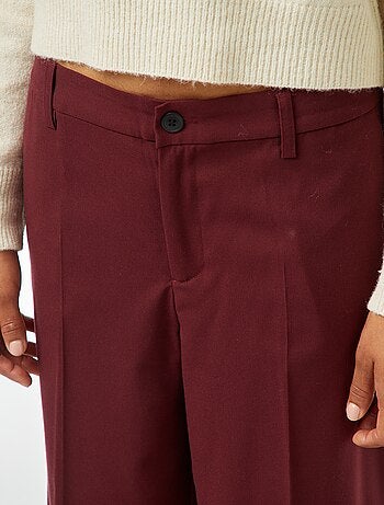 Pantaloni city larghi con pinces
