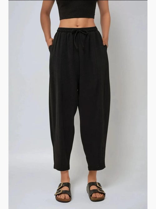Pantaloni comodi con elastico in vita hiccup - Kiabi Pantaloni comodi con elastico in vita hiccup - Kiabi