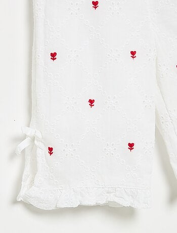 Pantaloni con fiocchi decorativi e ricami sangallo