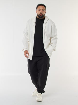 Pantaloni con fondo elasticizzato in cotone tinta unita