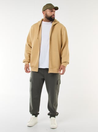 Pantaloni con fondo gamba aderente in cotone tinta unita