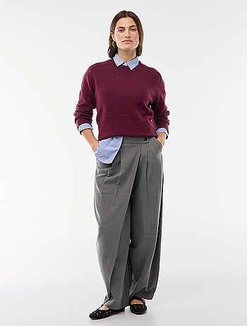 Pantaloni con pinces asimmetrici