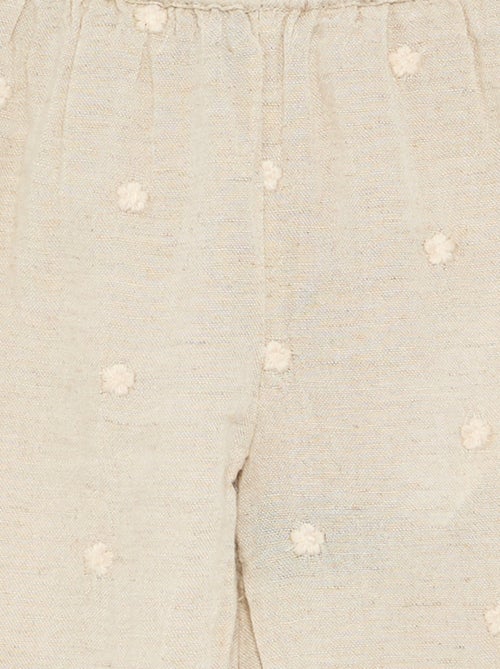 Pantaloni con ricami floreali - Kiabi