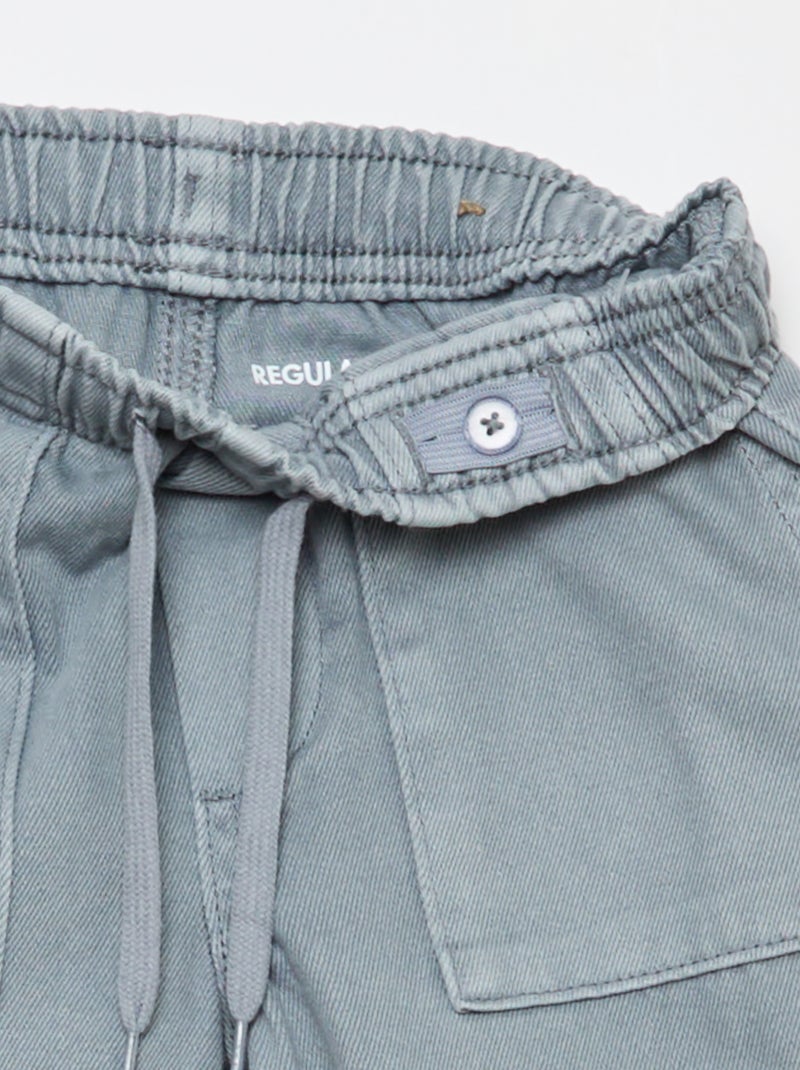 Pantaloni con tasche rettangolari - Taglio più aderente Blu - Kiabi
