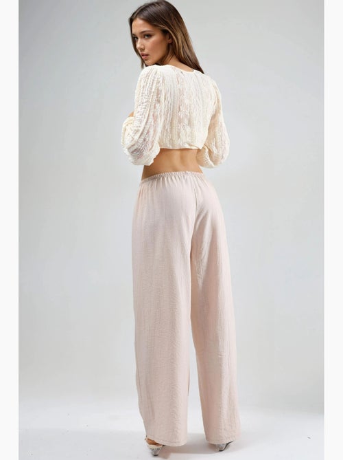 Pantaloni con vita elasticizzata e dettaglio con laccetto busem - Kiabi Pantaloni con vita elasticizzata e dettaglio con laccetto busem - Kiabi