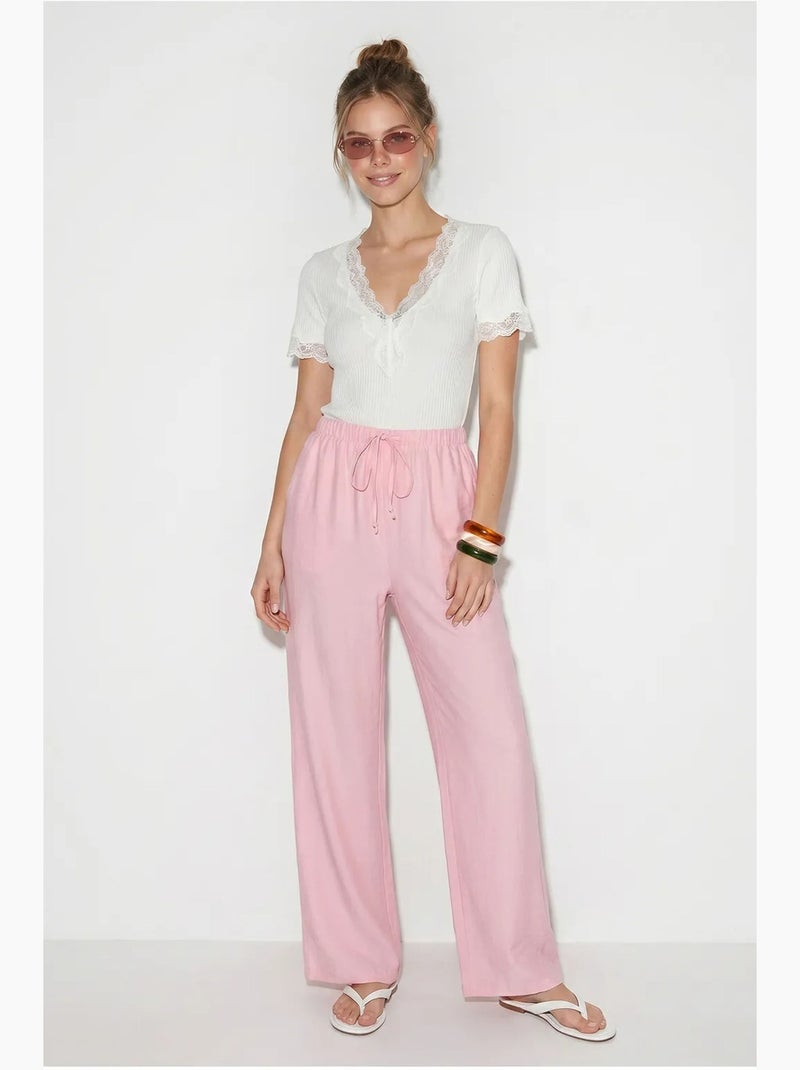 Pantaloni da donna a gamba ampia in crêpe lucci Rosa - Kiabi