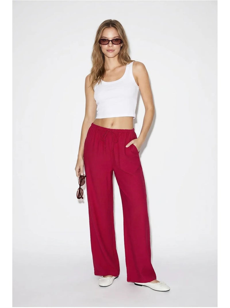 Pantaloni da donna a gamba ampia in crêpe lucci Rosso bordeaux - Kiabi