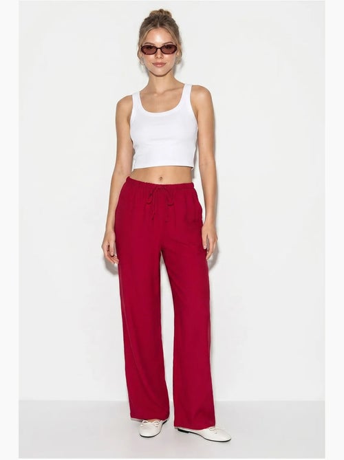 Pantaloni da donna a gamba ampia in crêpe lucci - Kiabi Pantaloni da donna a gamba ampia in crêpe lucci - Kiabi