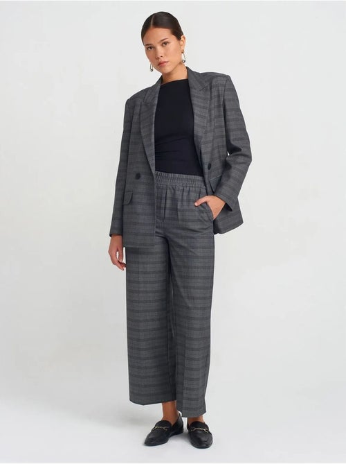 Pantaloni da donna a quadri a gamba ampia alla caviglia dilvin - Kiabi Pantaloni da donna a quadri a gamba ampia alla caviglia dilvin - Kiabi