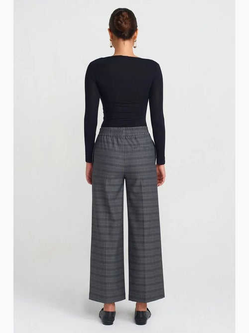 Pantaloni da donna a quadri a gamba ampia alla caviglia dilvin - Kiabi Pantaloni da donna a quadri a gamba ampia alla caviglia dilvin - Kiabi