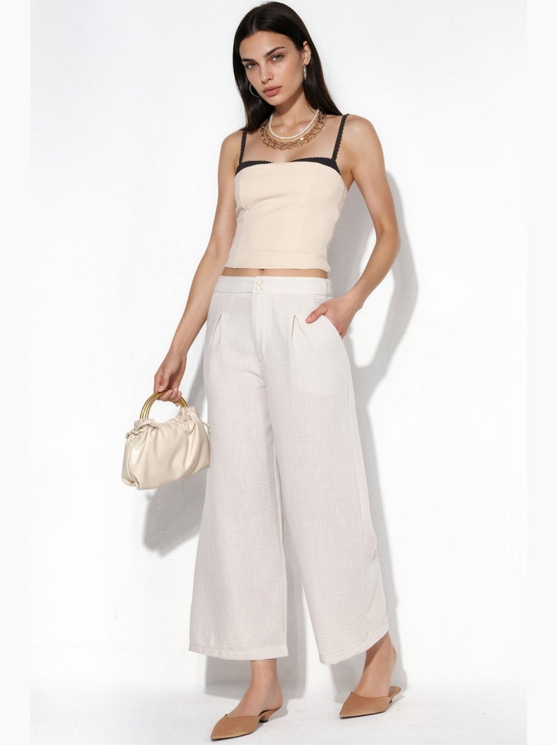 Pantaloni da donna a vita alta a gamba ampia busem Bianco sporco - Kiabi