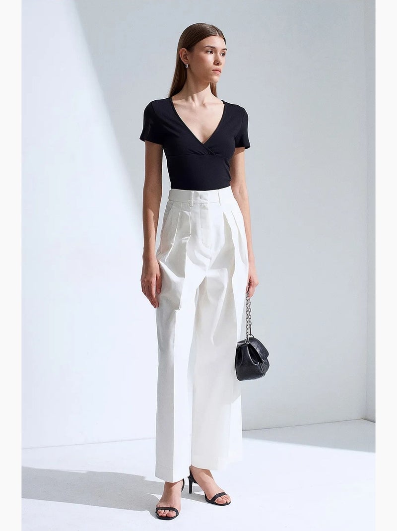 Pantaloni da donna a vita alta con pieghe e gamba ampia dilvin Bianco - Kiabi