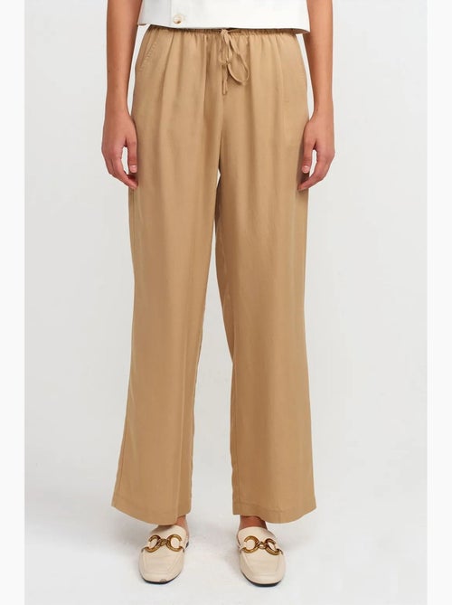 Pantaloni da donna in tencel a gamba ampia con vita con coulisse dilvin - Kiabi Pantaloni da donna in tencel a gamba ampia con vita con coulisse dilvin - Kiabi