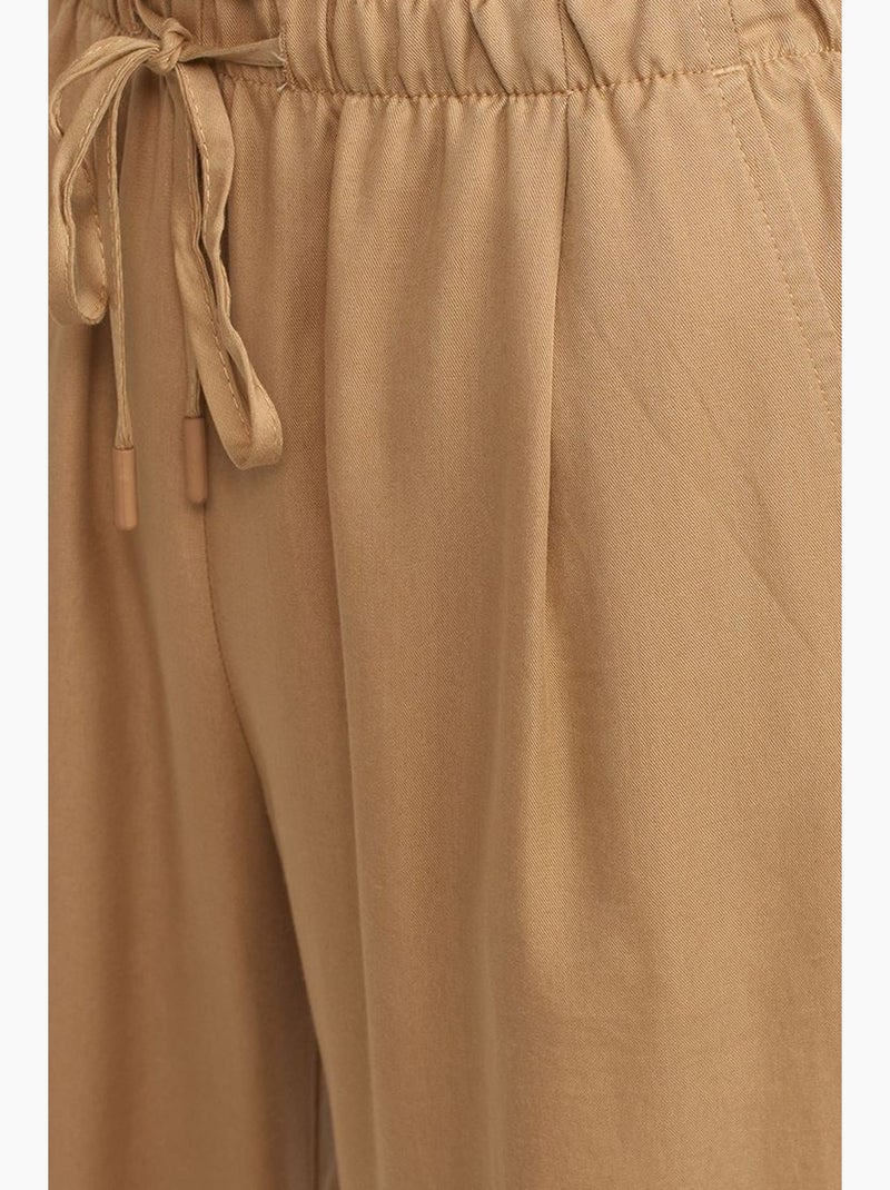 Pantaloni da donna in tencel a gamba ampia con vita con coulisse dilvin Cammello - Kiabi