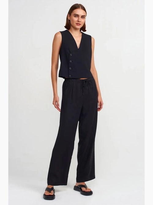Pantaloni da donna in tencel a gamba ampia con vita con coulisse dilvin - Kiabi Pantaloni da donna in tencel a gamba ampia con vita con coulisse dilvin - Kiabi