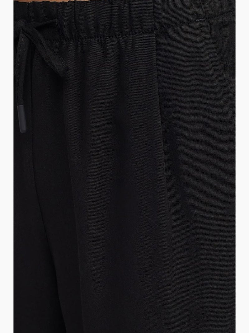 Pantaloni da donna in tencel a gamba ampia con vita con coulisse dilvin Nero - Kiabi