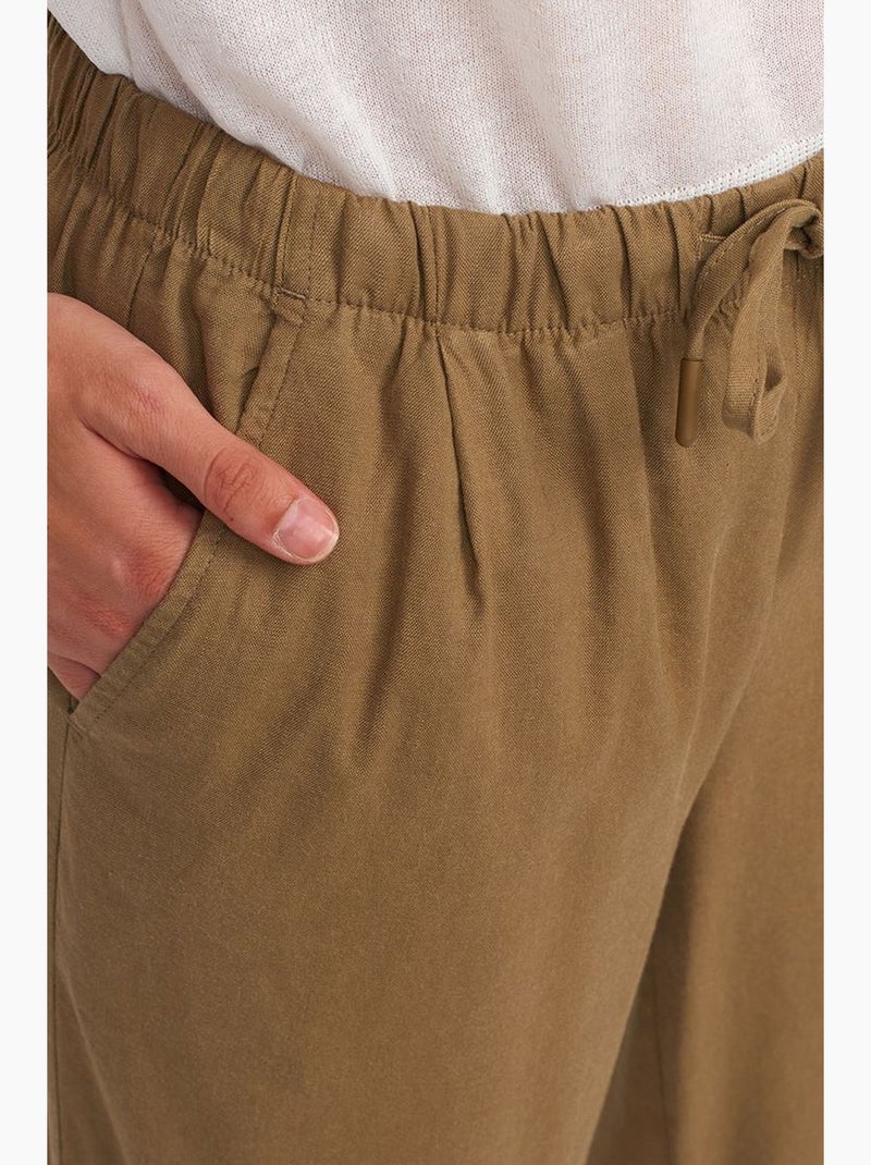 Pantaloni da donna in tencel a gamba ampia con vita con coulisse dilvin Verde kaki - Kiabi