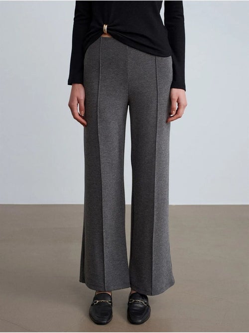Pantaloni da donna in tessuto a gamba ampia a vita media - Kiabi