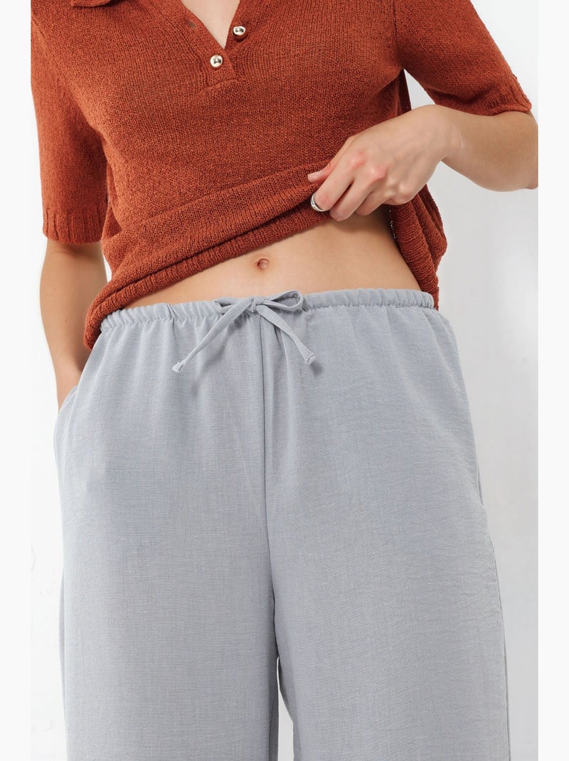 Pantaloni da donna in tessuto a gamba dritta busem Grigio chiaro - Kiabi