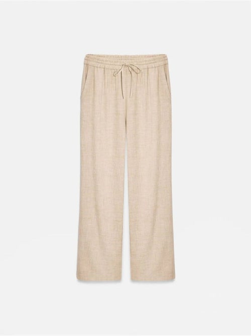 Pantaloni da donna in tessuto a gamba larga con vita con coulisse - Kiabi Pantaloni da donna in tessuto a gamba larga con vita con coulisse - Kiabi