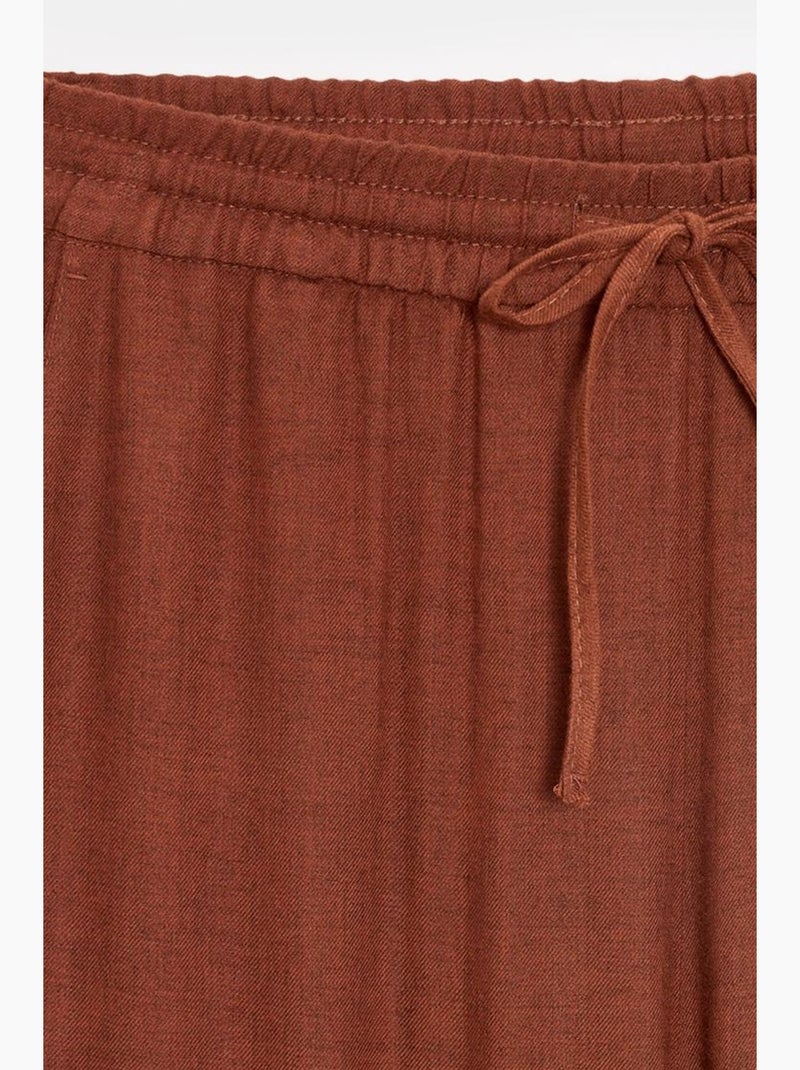 Pantaloni da donna in tessuto a gamba larga con vita con coulisse dilvin Terracotta - Kiabi