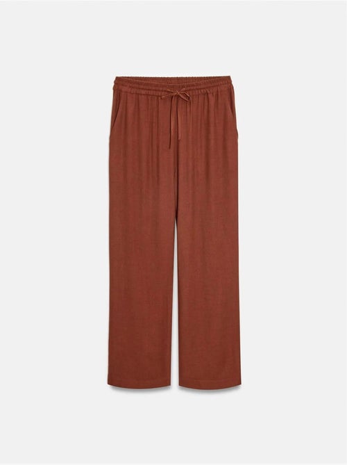 Pantaloni da donna in tessuto a gamba larga con vita con coulisse - Kiabi Pantaloni da donna in tessuto a gamba larga con vita con coulisse - Kiabi