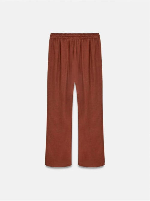 Pantaloni da donna in tessuto a gamba larga con vita con coulisse - Kiabi Pantaloni da donna in tessuto a gamba larga con vita con coulisse - Kiabi