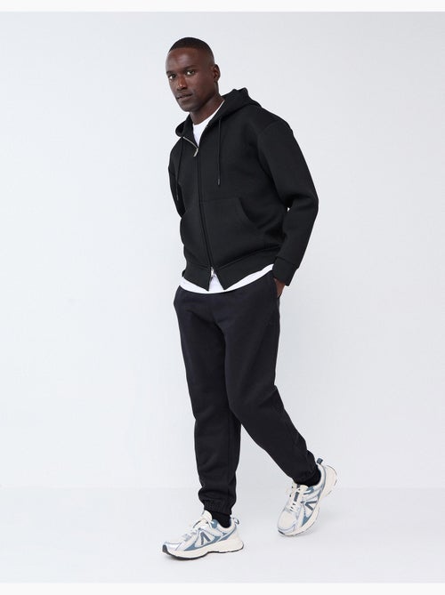 Pantaloni da jogger fatti di morbido, mo fashion - Kiabi Pantaloni da jogger fatti di morbido, mo fashion - Kiabi